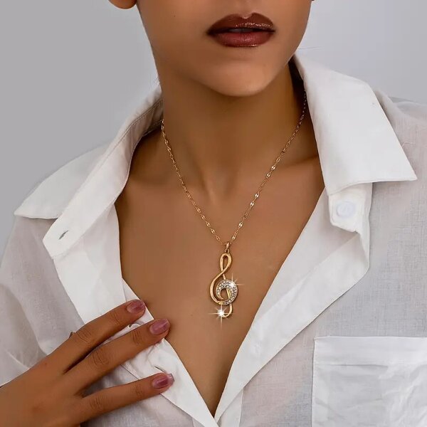 ROCK-HUS Halskette NotenschlÃ¼ssel Strass goldfarben